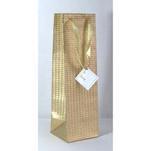 Metallic Golden Base Embossed Wine Bags, Feature : Handmade