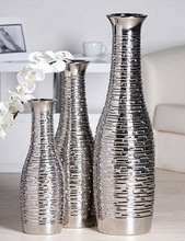 Tall aluminum vases