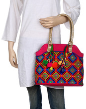 Stitched Woman Holding Bag