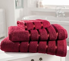Cotton bath towel with satin border