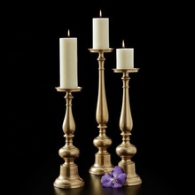 ALAM Gold metal candle stand, Shape : tall