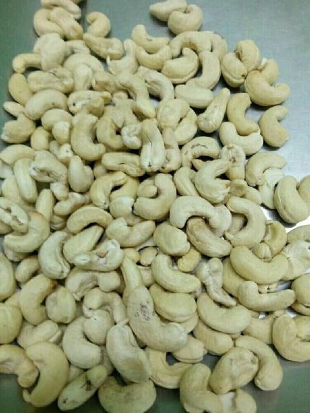 Curve cashew nut, for Food, Snacks, Sweets, Packaging Size : 10kg