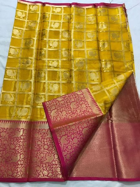 Kanchi organza sarees with heavy pallu and brocade blouse