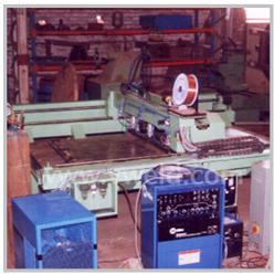 Automatic corrugated core panel welder