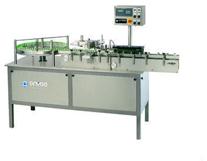 AUTOMATIC LINEAR LABELING MACHINE