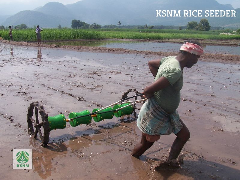 Hand operated rice seeding machine