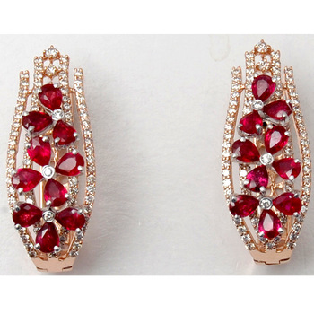 Glamorous prong set diamond studded pear ruby earrings