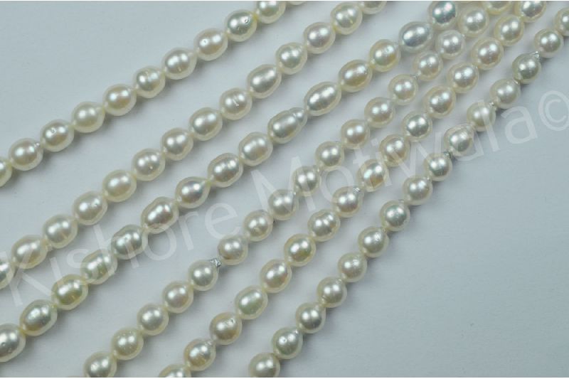 SOUTH SEA LONG SHAPE 8.5-9 MM WHITE COLOR PEARL BEADS