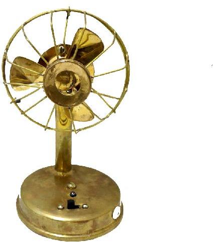 Brass colour fan showpiece