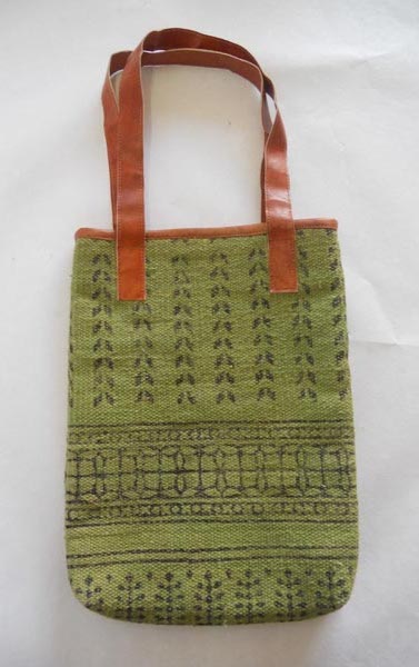 Hand woven cotton green color fanny style dhurrie hand bag