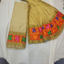 Phulkari suit on golden silk fabric and chinon dupatta