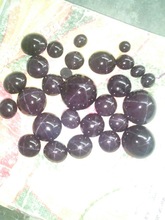 Garnet star cabochon