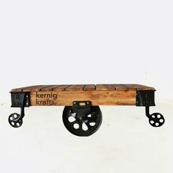 CAST IRON MANGO WOOD TOP MOVABLE WHEEL COFFEE TABLE