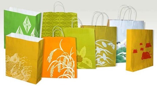 Fancy Printed Paper Bags, for Shopping Use, Style : Handled
