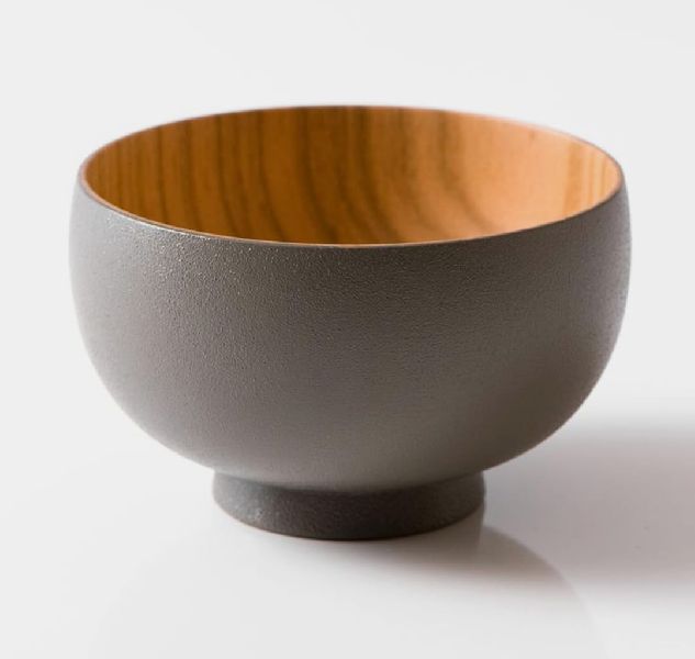 wooden bowl with enamel paint outside.