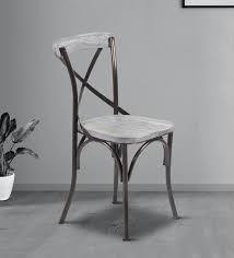 Polished Iron Dining Chair, for Home, Hotel, Restaurant, Feature : Attractive Designs, Fine Finishing