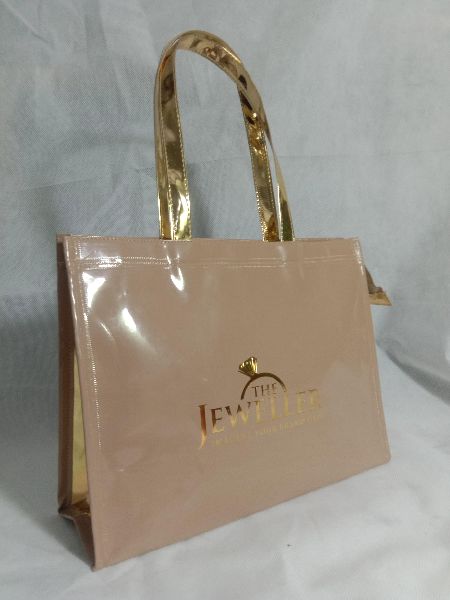 Golden Rexine Printed Jewellery Bag