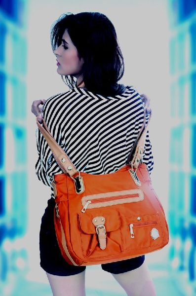 Plain Leather Ladies Orange Handbag, Size : Standard