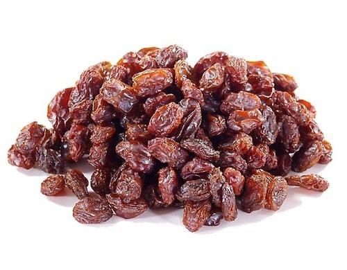 Elongated Brown Raisins, Taste : Sour, Sweet