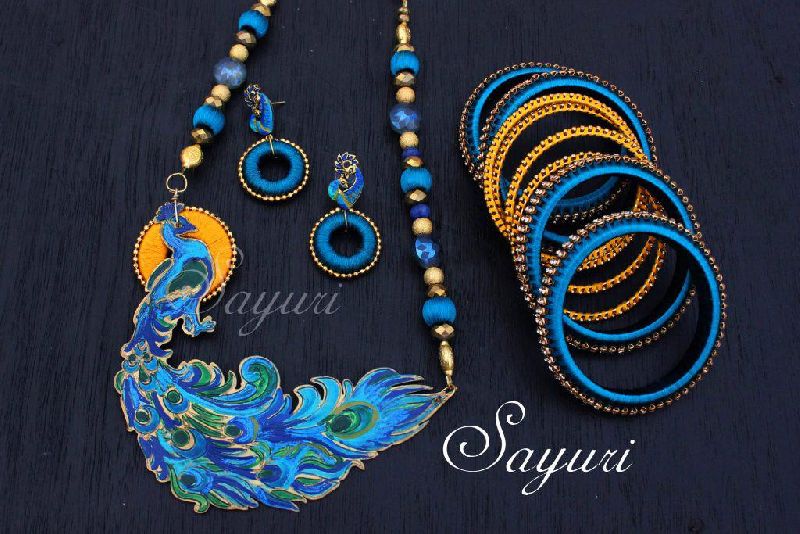 Buy Hasini Creations Purple and Orange Silk thread Designer jewelry set  (2.10) at Amazon.in