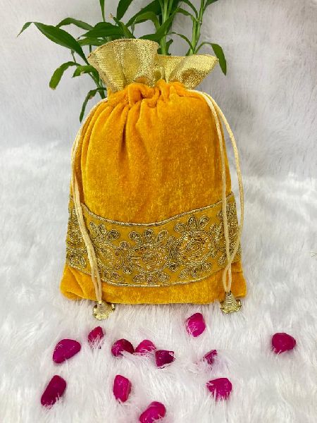 Embroidered Yellow Velvet Potli Bag, Technics : Attractive Pattern