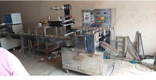 White 220v Electric 100-1000kg Automatic Flow Wrap Machine, For Horizontal Pouch Packing