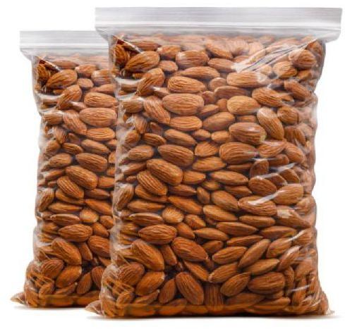 Common Almond Nuts, for Milk, Sweets, Style : Dried