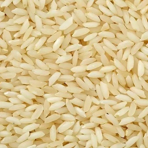 Hard Organic Steamed Rice, for Human Consumption, Feature : High In Protein