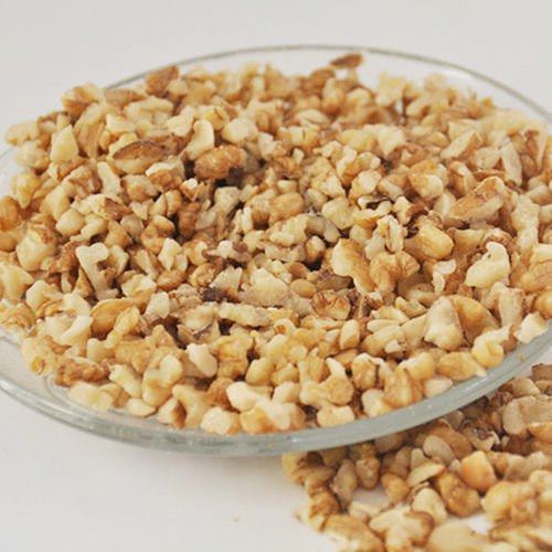 Broken Walnut Kernels, for Bakery, Chacolate, Nutritious Food, Style : Dried