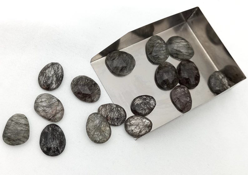 Oval Polished Black Rutile Gemstone, for Jewelry, Size : Standard