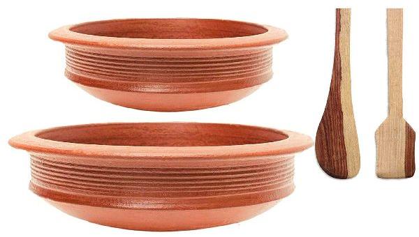 Red Clay Pot And Wooden Spatula