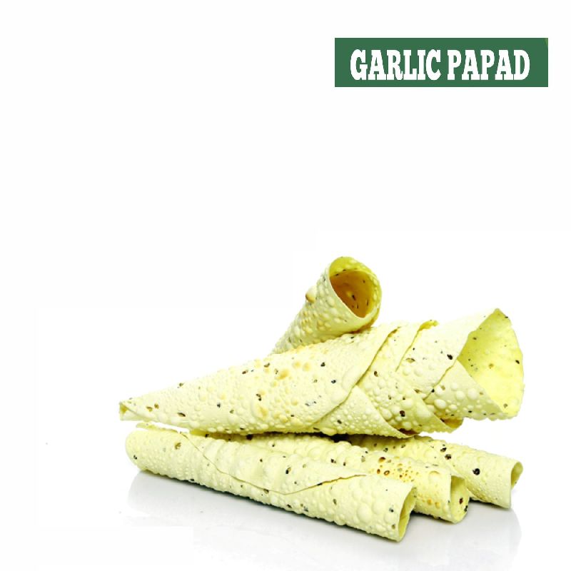 Garlic Papad, for Human Consumption, Taste : Salty
