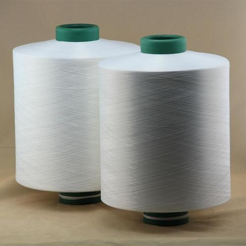 Polyester draw textured yarn, for Textile Industry, Pattern : Plain