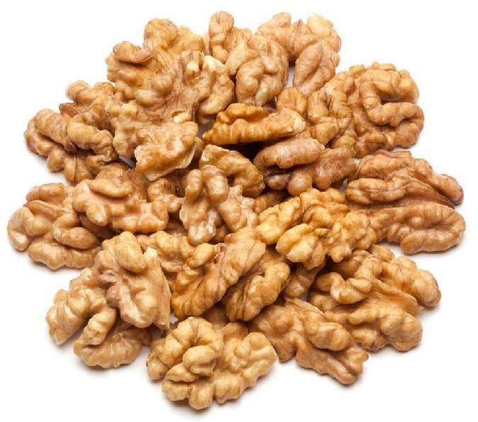 Snow White Kashmiri Walnut Kernels, for Bakery, Chacolate, Food, Health Care, Milk Shakes, Packaging Type : Bags