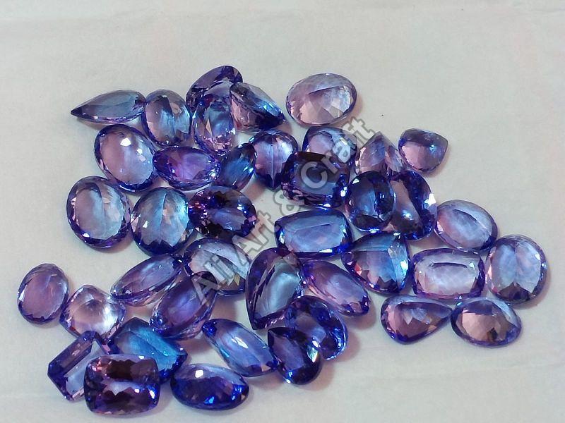 Round Blue oval Polished Tanzanite Faceted Gemstone, for Jewellery, Size : 0-10mm