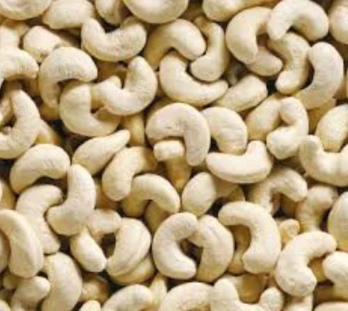 Creamy Whole Cashew Nut, for Oil, Human Consumption, Taste : Light Sweet