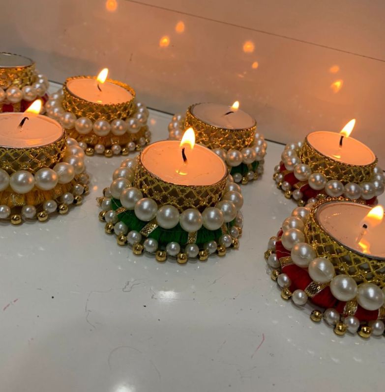 Golden Round China Clay Decorative Pearl Diya, for Decoration Use, Feature : Effective, Moisture Proof