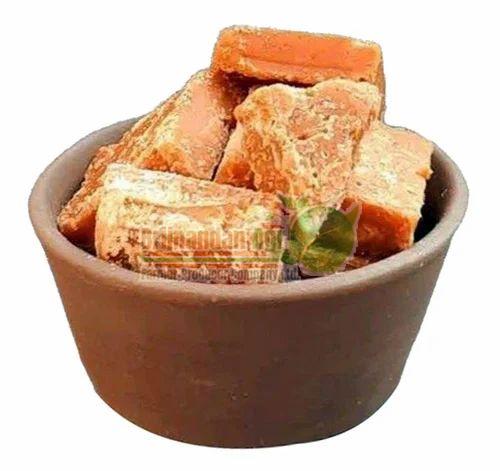 Brownish Natural Cardamom Flavoured Jaggery, for Sweets, Feature : Non Added Color