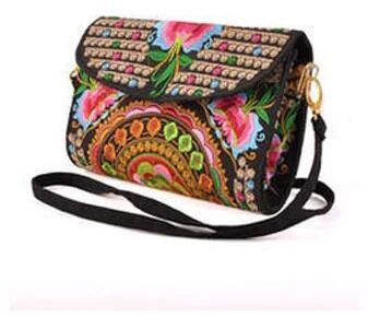 Elysian Exports Embroidery Ladies Designer PU Purse, Occasion : Party, Regular