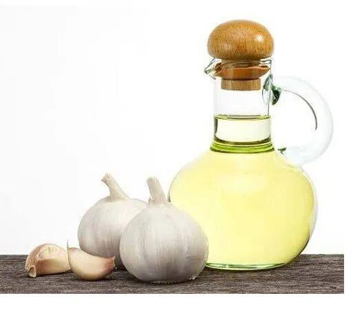 Garlic Essential Oil, Form : Liquid, Packaging Type : Container