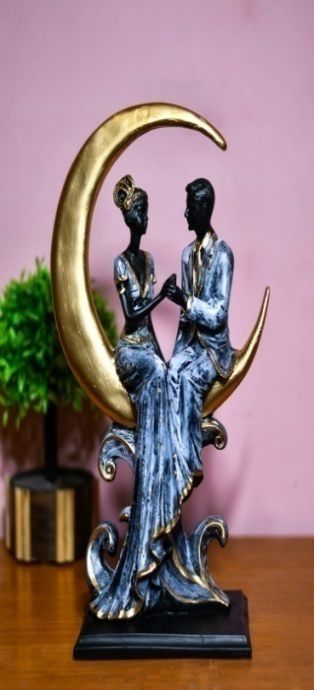 Polyresin Moon Sitting Couple Statue, for Home Decoration, Speciality : Attractive Look, Nice Finishing