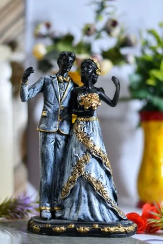 Polyresin Dancing Guldasta Couple Statue, for Interior Decor, Speciality : Attractive Look, Nice Finish