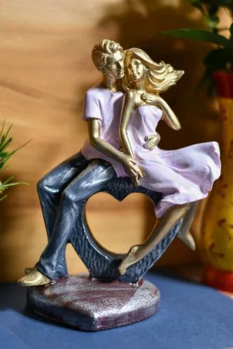 Polyresin Dil Couple Statue, for Interior Decor, Speciality : Attractive Look, Nice Finish