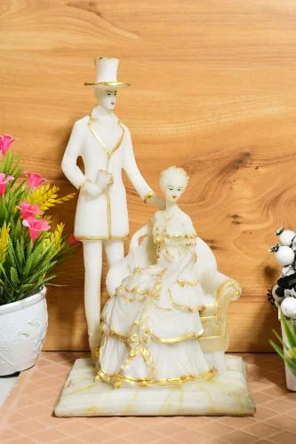 Polyresin White Sofa Couple Statue, for Interior Decor, Packaging Type : Carton Box