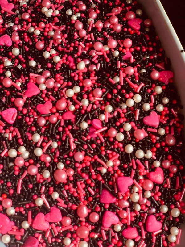 Pink and Black Mixed Cake Sprinkle, Packaging Type : Plastic Packets