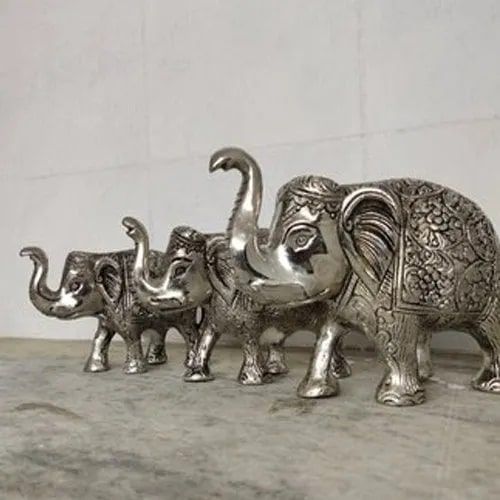 Metal Polished Elephant Statue Set, for Interior Decor, Packaging Type : Box