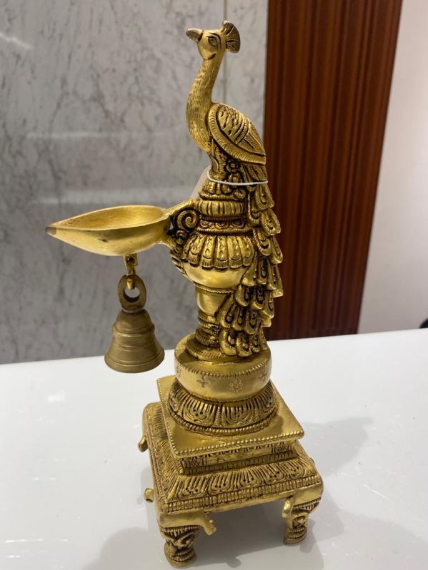 Golden Brass Peacock Bell Diya, for Decoration Use, Packaging Type : Box