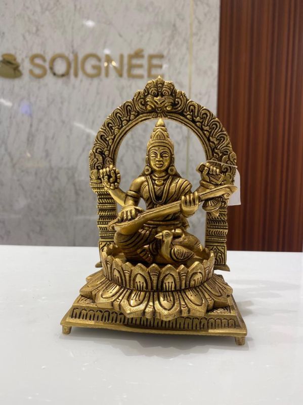 Plain Brass Saraswati Idol, for Worship, Temple, Interior Decor, Office, Home, Gifting, Packaging Type : Cardboard Box