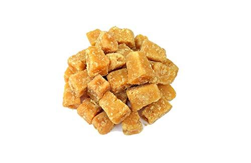 Brownish Natural Sugarcane Jaggery Cubes, for Sweets, Feature : Non Harmful