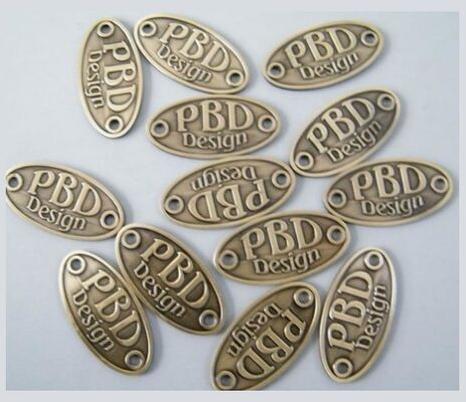 Metal Embossed brass badge, Shape : Rectangular, Square, Oval, Round